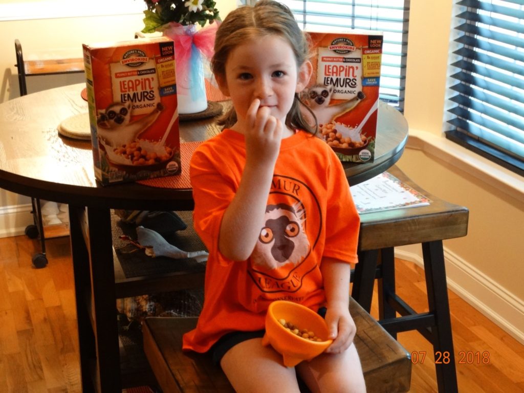 Young girl eating Leapin' Lemurs Cereal