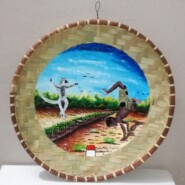 "The sifaka and the child" |
Sahafa painting |
Artist: Creation Mahafaly
Pictured is a "SAHAFA" (or "van" in French). It is a traditional cooking instrument (made of vegetable fiber) in Madagascar.